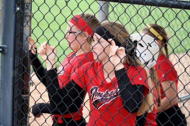 Youth softball players watch from a dugout during a tournament at Fun Valley in Hutchinson. The Hutchinson Recreation Commission and the city partnered together on the softball complex - with the city providing maintenance and rec handling operations - this year, with strong results.