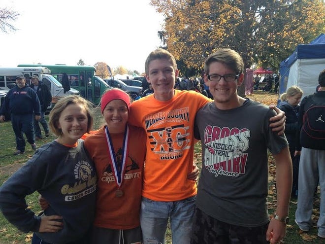 Heather Whan, Carli Skiles, Nick Hawk & Ethan Morrow at cross country state tournament in Peoria. Skiles & Morrow qualified as individuals. Whan was selected by Skiles and Hawk by Morrow to be their practice partner at state.