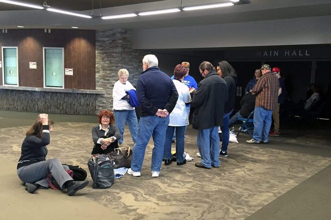 A line forms outside of the main entrance to the Prairie Capital Convention Center around 2 p.m. Monday, five hours before presidential candidate Donald Trump was scheduled to appear.