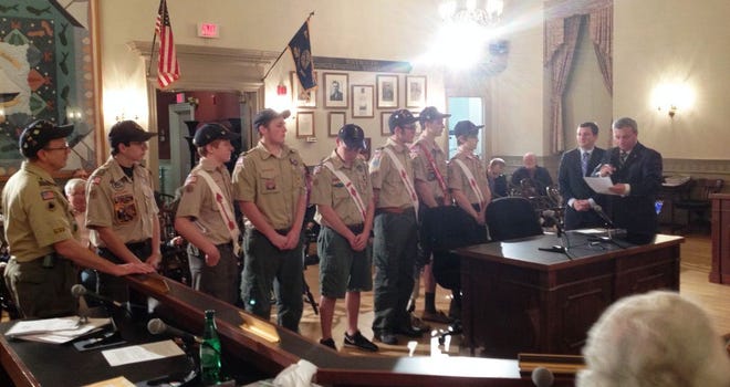 Members of Boy Scout Troop 9 receive a citation form the Weymouth Town Council on Nov. 9, 2015, for their efforts to help an injured woman off a New Hampshire mountain in October. Left to right: Assistant Scout Master Mike Jaklitsch, Assistant Scout Master Steve Lee, Tommy Jaklitsch, Dillon Lawlor, Nick Ames, Sebastian Pizzuto, Matt Freitas, Jacob Preble, Council President Patrick O'Connor and Councilor Michael Smart.