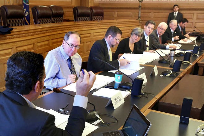 Gov. Sam Brownback and legislative leaders on the State Finance Council on Monday approved extra cash for school districts facing falling property values and other pressures - ultimately doling out about $4 million.