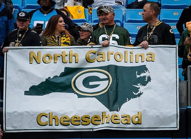 Mike Dobs of Fayetteville said that although he had permission from the Panthers to hold a Green Bay banner at Sunday's game in Charlotte, Cam Newton snatched it away during the game.