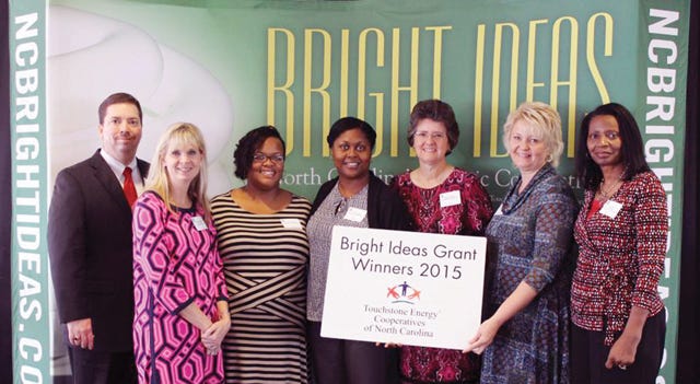 From left, Associate Superintendent Brent Williams, Kinston High Principal Tina Letchworth, Pamela Stanley and Kristal Suggs of Southeast Elementary, Melanie McCoy of Northeast Elementary, Kimberly Collette of Kinston High and Northeast Elementary Principal Lorene Bell celebrate their schools being awarded a combined $4,300 from the Bright Ideas Education Grants.