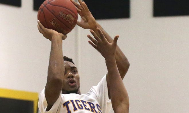 Chipley's Trent Forrest puts up a shot against Mosley in a preseason game Tuesday.