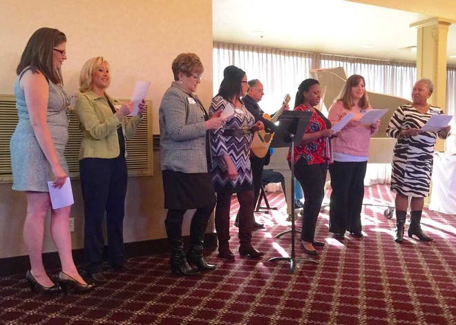 United Way ambassadors took to song at the end of a breakfast at which they were honored Thursday morning at the Ramada Hotel and Convention Center, 420 S.E. 6th. The ambassadors sang their versions of the Backstreet Boys "I Want it That Way" and the Village People's "YMCA," with lyrics geared toward supporting the United Way.
