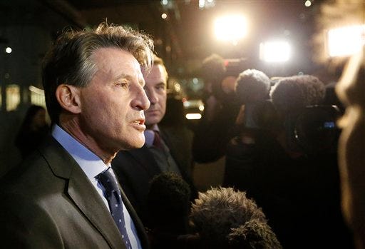 IAAF President Sebastian Coe gives a statement to journalists outside his office in London, Friday, Nov. 13, 2015. Russia's track and field federation has been suspended by governing body IAAF. (AP Photo/Frank Augstein)