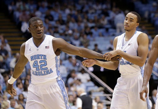Seniors Joel James, left, and Brice Johnson are a few of the pieces for this year's North Carolina squad, which the season with a No. 1 ranking and without the services of fellow senior Marcus Paige.