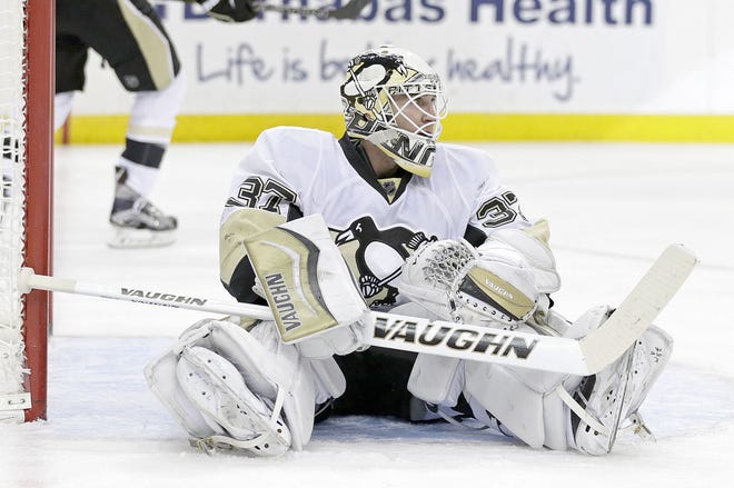 Penguins goalie Jeff Zatkoff reacts after giving up a goal to Devils left wing Mike Cammalleri during the second period of Saturday’s game in Newark, N.J.