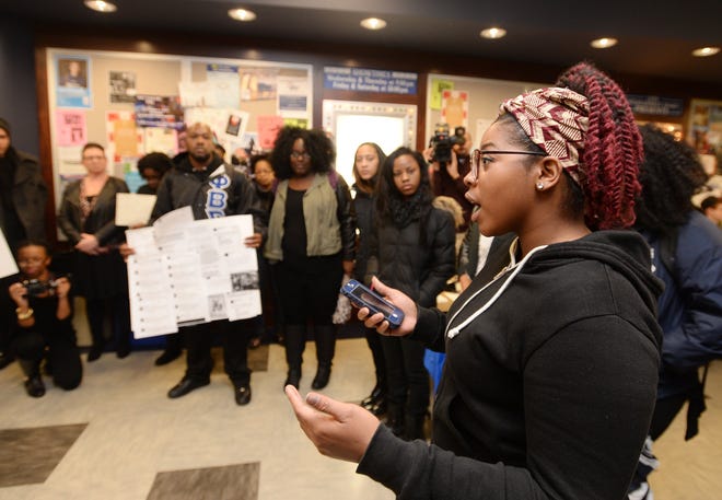 Penn State Behrend student Ally Johnson, 20, vice president of the Association of Black Collegians speaks during a protest Nov. 13 at the Reed Union Building to show support for the students protesting at the University of Missouri. (AP Photo/Erie Times-News, Jack Hanrahan)