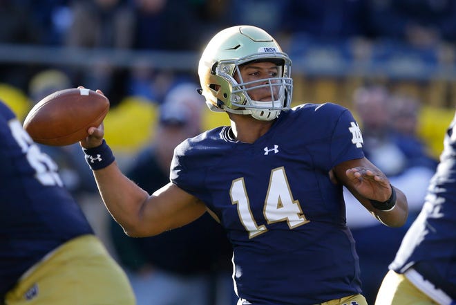 Notre Dame quarterback DeShone Kizer (14) throws against Wake Forest during the first half of an NCAA college football game in South Bend, Ind., Saturday, Nov. 14, 2015. (AP Photo/Michael Conroy)