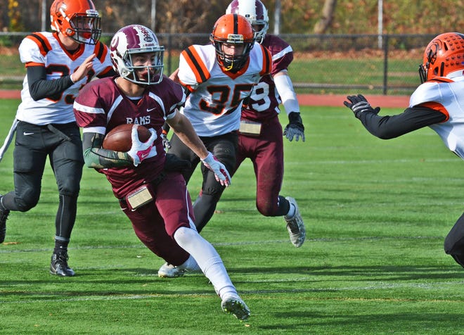 Northbridge's Koby Schofer runs for a first down. Chris Christo photo