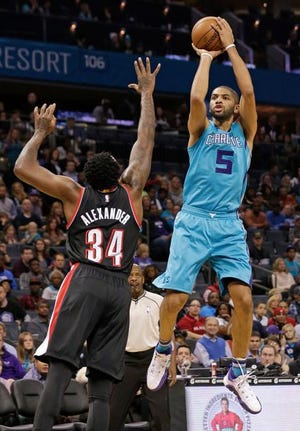Nicolas Batum goes for a shot during his 33-point game in Sunday's win over Portland.