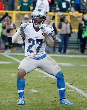 Detroit Lions' Glover Quin reacts after an NFL football game against the Green Bay Packers Sunday, Nov. 15, 2015, in Green Bay, Wis. The Lions won 18-16.