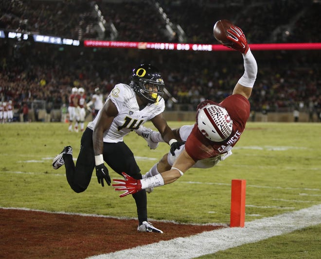 Oregon's Ugo Amadi defends against Stanford's Devon Cajusted but was called for pass interference on the play setting up a Stanford touchdown near the end of the Ducks' game against Stanford at Stanford Stadium in Palo Alto on Saturday, November 14, 2015. (Andy Nelson/The Register-Guard)
