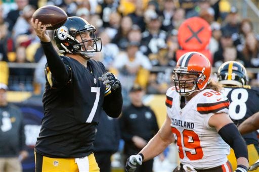 Pittsburgh Steelers quarterback Ben Roethlisberger (7) passes as Cleveland Browns outside linebacker Paul Kruger (99) pressures in the fourth quarter of an NFL football game, Sunday, Nov. 15, 2015, in Pittsburgh. The Steelers won 30-9. (AP Photo/Gene J. Puskar)