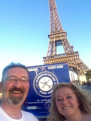 Former Cape Cod resident Roger Le Roy and his fiancee, Nathalie Moine, decided to maintain their routine in the face of terrorism and keep their food truck, La Cabane de Cape Cod, open throughout the weekend in Paris. Photo courtesy of Nathalie Moine
