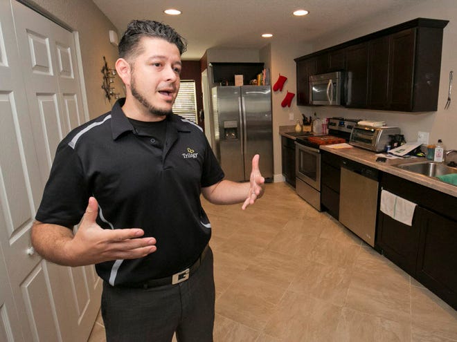 Jeremiah Goodrich said that the home was a good fit for his family. "We picked out the cabinets, tile adn the wall colors" Goodrich said. Tom Cafaro, project manager of the Coral Gables development in Belleview, FL, talked about his development Tuesday afternoon, November 17, 2015.