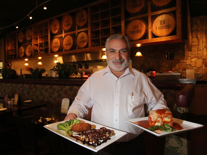 Francesco's Ristorante in Summerfield is one of several local eateries that will be open on Thanksgiving. In this file photo, Francesco Esposito shows off Mahi Mahi, left, and Lasagna.