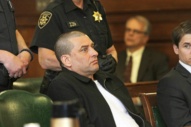 Donald Greenslit, pictured in 2013 as was sentenced to life in prison for killing and dismembering his girlfriend, Stacie DeSantis-Dorego, the mother of his two children.