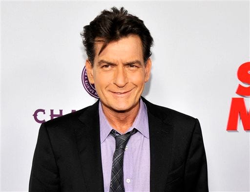 In this April 11, 2013 file photo, Charlie Sheen, a cast member in "Scary Movie V," poses at the Los Angeles premiere of the film at the Cinerama Dome in Los Angeles. Sheen is set to “make a revealing personal announcement” on NBC's “Today” show on Tuesday, Nov. 17, 2015, NBC announced on Monday.