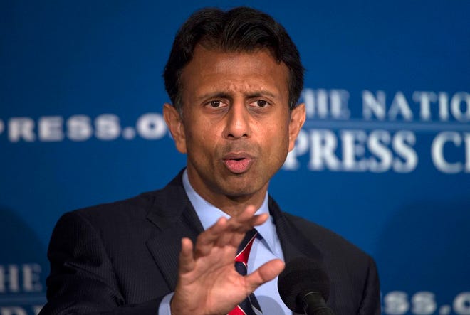 In this Sept. 10, 2015 file photo, Republican presidential candidate, Louisiana Gov. Bobby Jindal speaks at the National Press Club in Washington. Jindal offers history from a conservative viewpoint in a new book illustrating the “folly of looking to the government for the solution to all of our problems.” Tracing an arc from the Bill of Rights to President Barack Obama’s health care law, the Louisiana governor came out Tuesday with “American Will,” a book meant to advance his struggling campaign.  (AP Photo/Molly Riley, File)