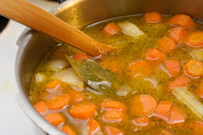 A bay leaf sits in a pot of roasted carrot soup.

Photo by K. Yasuhara (Own work) [CC BY-SA 2.0 (http://creativecommons.org/licenses/by-sa/2.0)], via Flickr Creative Commons