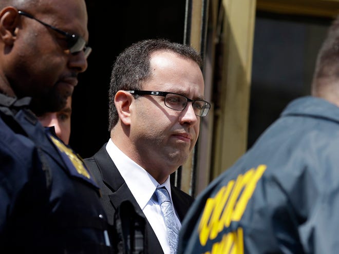 In this Aug. 19, 2015, file photo, former Subway pitchman Jared Fogle leaves the federal courthouse in Indianapolis, following a hearing on child-pornography charges. Fogle is scheduled Thursday to face a federal judge in Indianapolis for sentencing, after agreeing in August to plead guilty to charges of illicit sexual conduct with a minor and receiving child pornography.