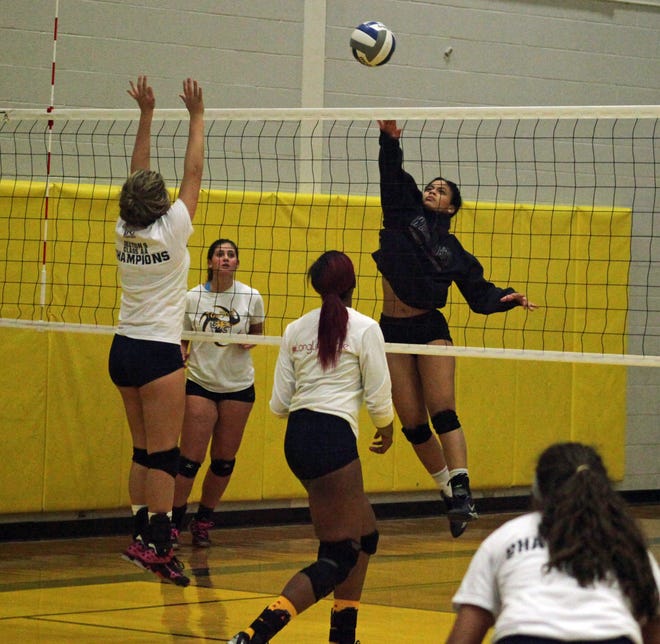 Pine Bush senior right side hitter Zara Velez leaps to hit the ball over the net during practice Tuesday. Pine Bush (19-1) rallied to defeat Scarsdale in the state Class AA quarterfinals Saturday. William Montgomery/Times Herald-Record