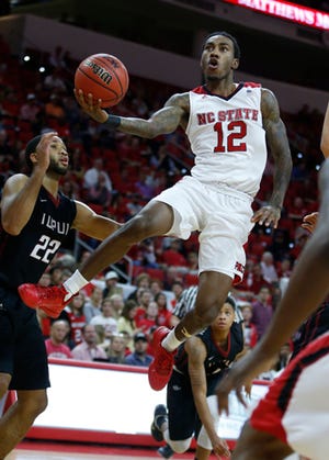 N.C. State junior Cat Barber goes up for a layup against IUPUI's Marcellus Barksdale during Wednesday night's game.