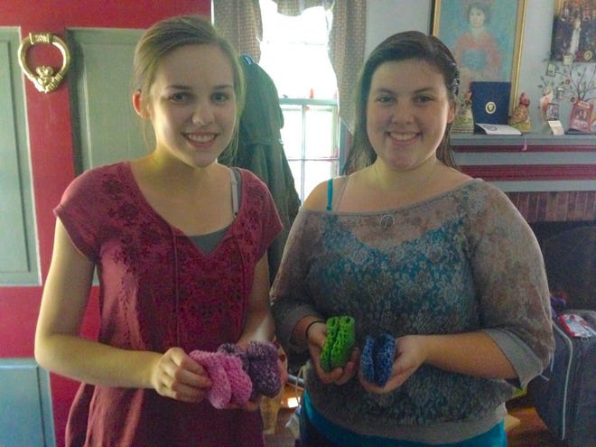 Emily (left) worked this summer with fellow CR North senior Emma Lambert's organization, Love Knots Preemie Bundles, which collects knitted or crocheted items for premature babies.