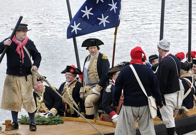 John Godzieba, portraying Gen. George Washington, boards the boat with his men last year as they re-enact the crossing of the Delaware River on Christmas Day.