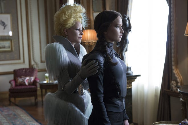 Elizabeth Banks as Effie Trinket, left, and Jennifer Lawrence as Katniss Everdeen in a scene from "The Hunger Games: Mockingjay Part 2."

Lionsgate