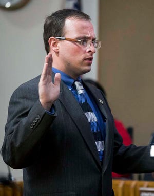 Jonathan Schumm, embattled city councilman, will remain on Topeka's governing body during an investigation into charges of aggravated battery and other offenses in which the victims were children.