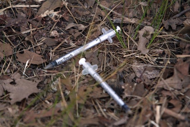Needles found in a Hyannis homeless camp in September. Steve Haines/Cape Cod Times