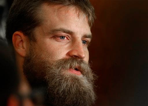 New York Jets quarterback Ryan Fitzpatrick talks to the media after practice at the team's NFL football training facility, Wednesday, Nov. 18, 2015, in Florham Park, N.J. (AP Photo/Rich Schultz)