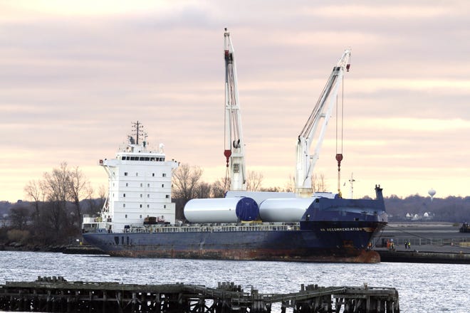 Tower sections for Deepwater Wind's five-turbine demonstration wind farm off Block Island began arriving Wednesday at the Port of Providence, where they will be outfitted with turbine support systems over the winter. The Providence Journal/Kris Craig