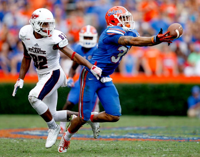 Florida Gators defensive back Jalen Tabor (31) nearly intercepts a pass intended for Florida Atlantic Owls wide receiver Kamrin Solomon (82) during the second half at Ben Hill Griffin Stadium on Saturday, Nov. 21 2015 in Gainesville, Fla. Florida defeated FAU 20-14 in overtime. Matt Stamey/Staff photographer