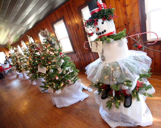 Guests were invited to bid on pre-decorated Christmas trees at the Junior Women’s Club of Sparta’s Festival of Trees held Friday and Saturday at the Barn at Hillside Park. There were also silent auctions and wreaths for sale.