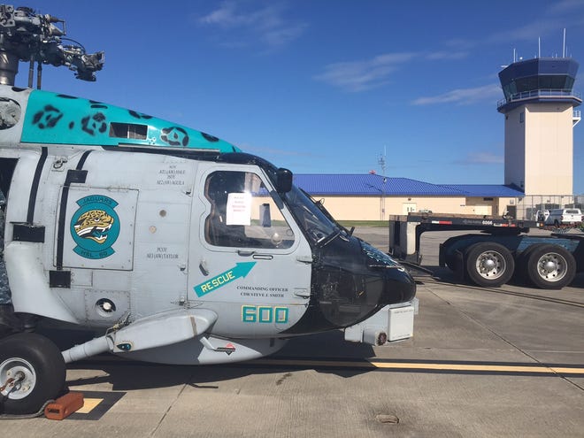 The fleet's last SH-60B Seahawk helicopter gets ready to be lifted onto a truck and driven away after the entire helicopter class is retired. HSM-60 was the last squadron to fly the Seahawk during deployment.