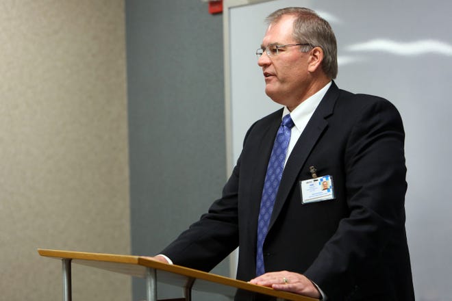 Ken Johnson gives his remarks after being announced as the new president and chief executive officer of the Hutchinson Regional Healthcare System on Tuesday.
