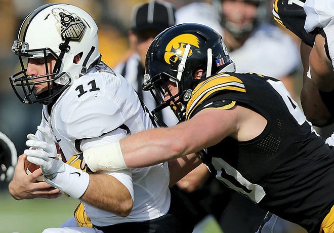 Iowa linebacker Parker Hesse sacks Purdue quarterback David Blough during the first half on Saturday in Iowa City, Iowa. Nebraska, which knocked off an unbeaten Michigan State two games ago, gets another opportunity to ruin an opponent's perfect record. This time it's third-ranked Iowa.