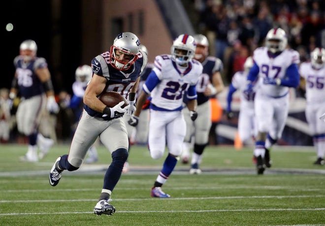 New England Patriots wide receiver Danny Amendola runs after catching a pass in the third quarter of an NFL football game against the Buffalo Bills, Monday, Nov. 23, 2015, in Foxboro. Amendola left the game with a knee injury later in the quarter.