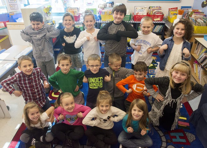 First-graders in Andrea Magnifico's class at Center Grange Primary School talk about Thanksgiving while also showing off their best impression of a turkey.