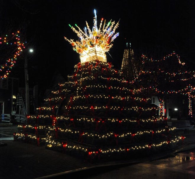 The Provincetown Lobster Pot Christmas Tree will be lit for the 11th year and the colorful buoy topper raised into place at 5:30 p.m. Saturday at Lopes Square near MacMillan Wharf, 308 Commercial St. This year's tree will be created with 112 real lobster pots (traps), 120 red bows, 58 buoys, 46 plastic lobsters and 3,400 LED lights. The tree, first built by Julian Popko in 2004, will be lit nightly through Feb. 2016. The tree can be seen on live cam at www.provincetownview.com.