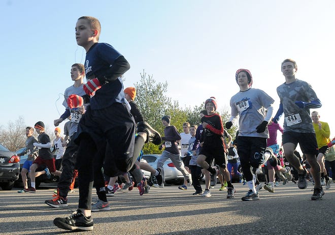 Runners start the Turkey Trot Family 5K Fun Run, Thursday in Franklin. Daily News and Wicked Local Staff Photo/John Thornton
