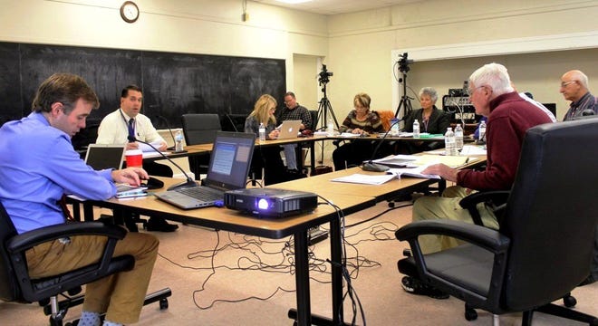 Far left, Wareham High School Principal Scott Palladino explains his Fiscal Year 2017 budget requests during a budget conference including members of the school district, Wareham School Committee and Wareham Finance Committee.

Wicked Local Photo/Chris Shott
