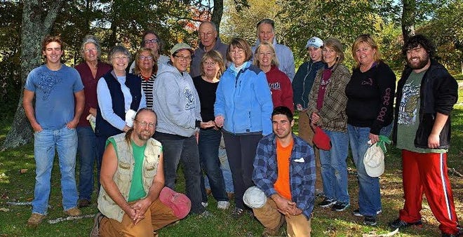 Craig Chartier, front left, and some of the volunteers at this year's dig at Taylor-Bray Farm, hours before the discovery of artifacts dating to 8,000-10,000 years ago.

Courtesy photo
