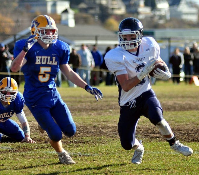 Hul'ls Fern Barry, left, chases Cohasset's Chris Norton during the Skippers' Thanksgiving Day win at Hull Thursday, Nov. 26, 1015. Wicked Local Photo