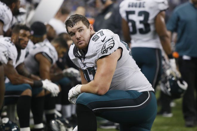 Philadelphia Eagles defensive end Taylor Hart (97) waits in the bench area during the second half of an NFL football game against the Detroit Lions, Thursday, Nov. 26, 2015, in Detroit. The Lions defeated the Eagles 45-14.