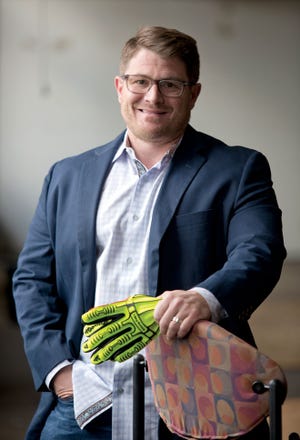 Dustin McMillan, owner of Gluvco, has his main office at the Idea Foundry in Franklinton.